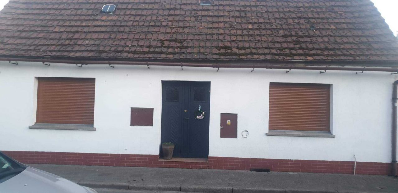 dom wolnostojący, 2 pokoje Jutrosin, ul. Szkolna. Zdjęcie 1