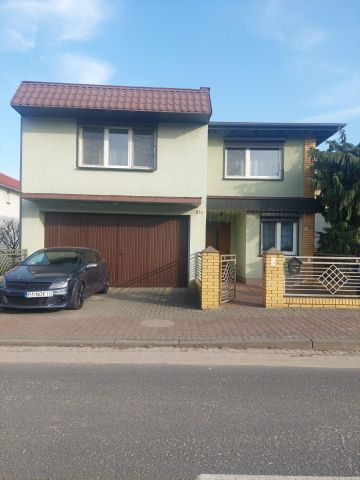 dom wolnostojący, 5 pokoi Grodzisk Wielkopolski, ul. Kwiatowa. Zdjęcie 1