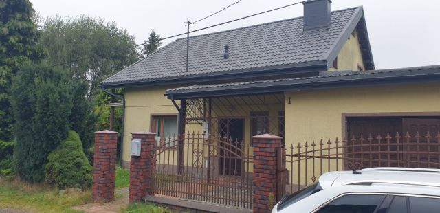 dom wolnostojący, 4 pokoje Justynów, ul. Kwiatowa. Zdjęcie 1