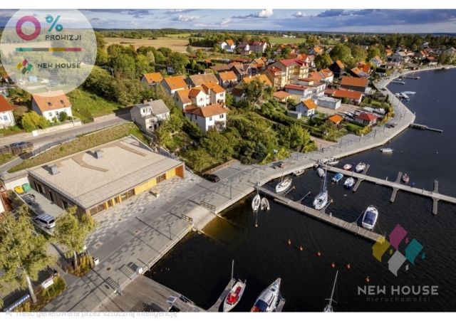 dom wolnostojący, 4 pokoje Mikołajki, ul. Michała Kajki. Zdjęcie 1