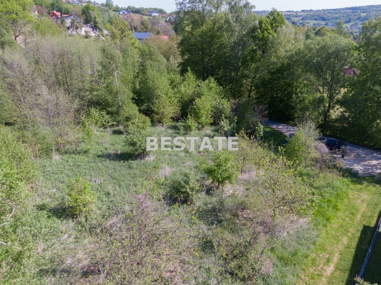 Działka budowlana Pleśna. Zdjęcie 2