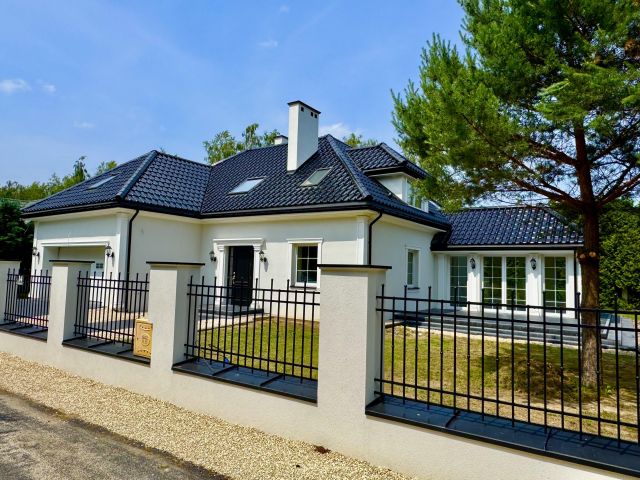 dom wolnostojący, 7 pokoi Rozalin, ul. Jagodowa. Zdjęcie 1