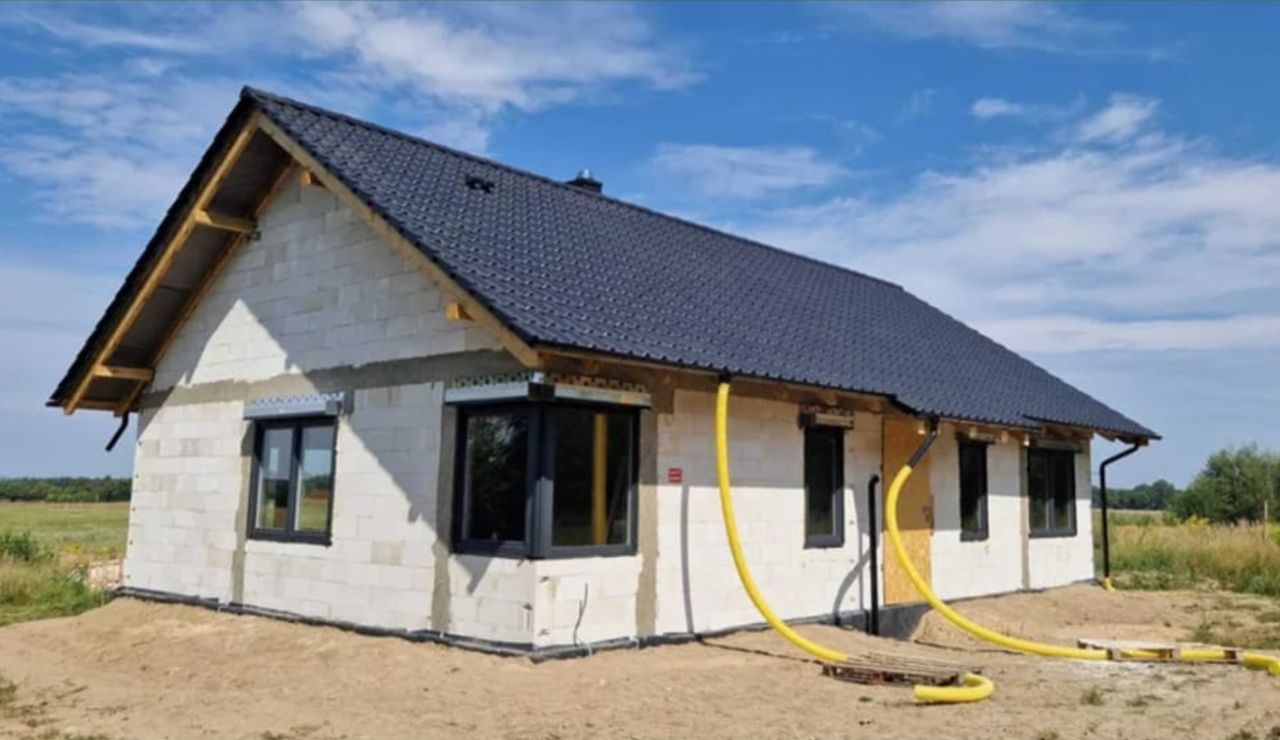 Mostki, os. Osiedle Słoneczne Dom wolnostojący - stan surowy zamknięty - 105 m² - 3 pokoje